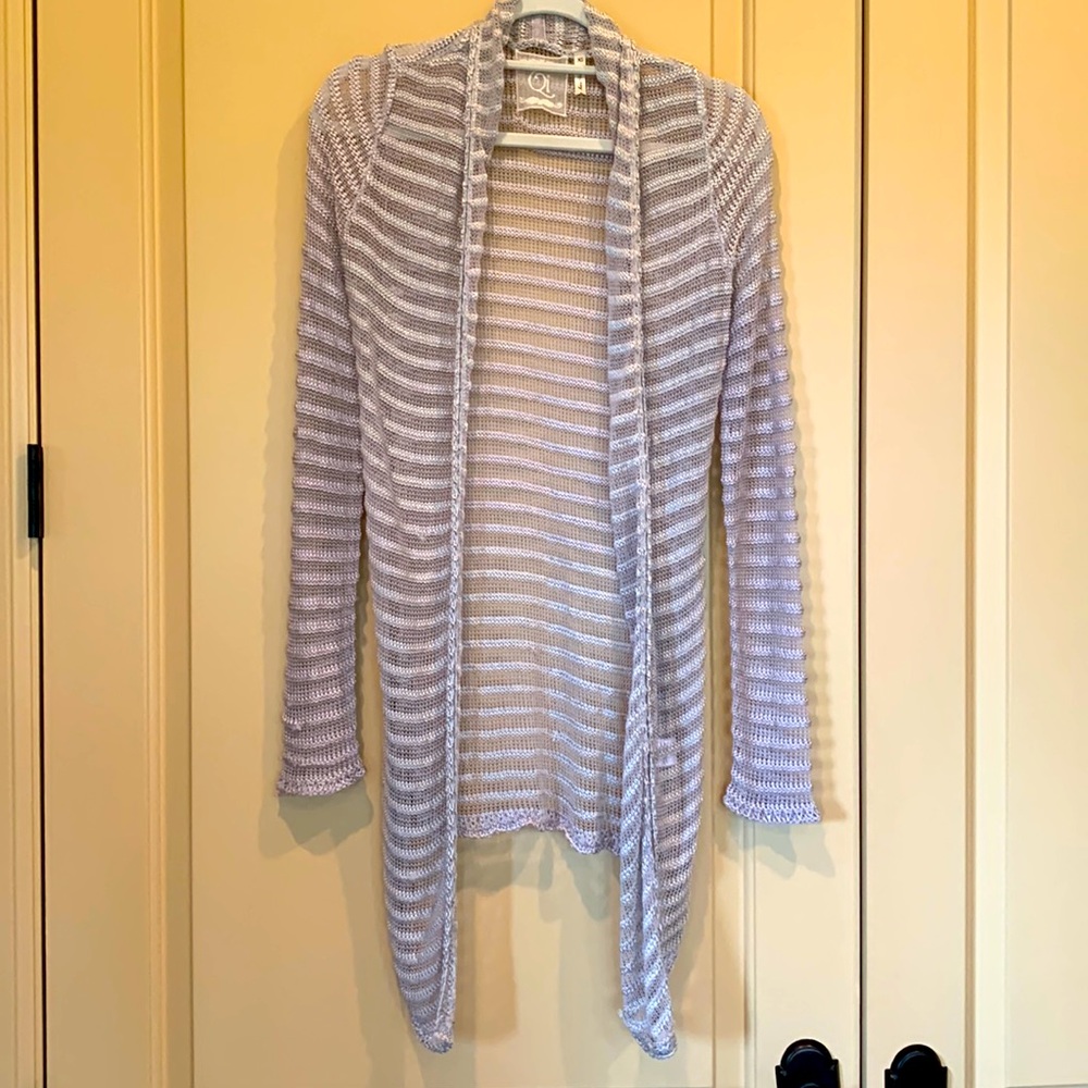 Light crochet sweater. Flowy, feminine. Neutral light silver color